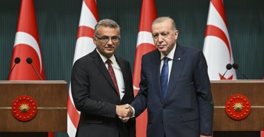 President Recep Tayyip Erdoğan (R) and Tufan Erhürman, the newly elected president of the Turkish Republic of Northern Cyprus (TRNC), shake hands after a joint news conference, Ankara, Türkiye, Nov. 13, 2025. (AA Photo)