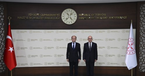 Treasury and Finance Minister Mehmet Şimşek (R) poses alongside Asian Development Bank President Masato Kanda at the Treasury and Finance Ministry headquarters, Ankara, Türkiye, Nov. 12, 2025. (AA Photo)