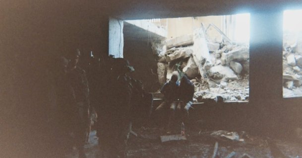 This photo, provided by Breaking the Silence, a whistleblower group of former Israeli soldiers, shows two detainees used as human shields being held inside a house in the Gaza City area in 2024. (AP Photo)