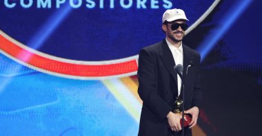 Bad Bunny accepts the award for Best Urban Song for "DeBi TiRAR MaS FOToS" at the 26th Annual Latin Grammy Awards in Las Vegas, Nevada, U.S., Nov. 13, 2025. (Reuters Photo)