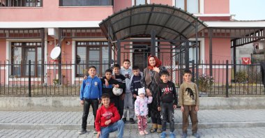 A group of Ahıska Turks pose for a photo during an interview with Anadolu Agency (AA), Ahlat, Bitlis, Türkiye, Nov. 14, 2025. (AA Photo)