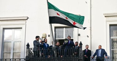 The Syrian flag flutters as Foreign Minister Assad Hassan Shaibani reopens his country&#039;s diplomatic mission, London, England, Nov. 13, 2025. (AA Photo)
