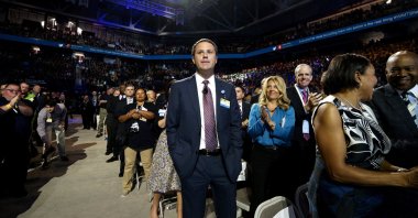 Walmart CEO Doug McMillon (C) is applauded after speaking at the company&#039;s annual meeting in Fayetteville, Arkansas, U.S., June 5, 2015. (Reuters Photo)