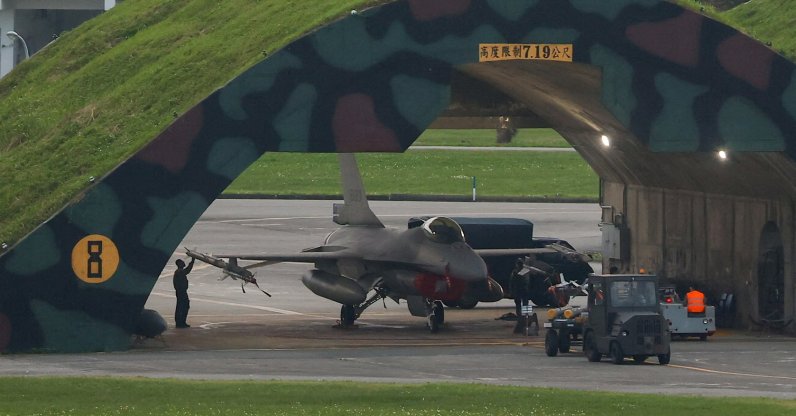A technician works on an F-16 plane at an air force base in Hualien, Taiwan, April 8, 2023. (Reuters Photo)