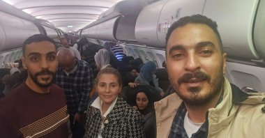 Hanan Jarrar, Palestinian ambassador to South Africa, smiles for a picture on a plane in a location given as given as Johannesburg, South Africa, in this handout image released on Nov. 13, 2025. (Reuters Photo)