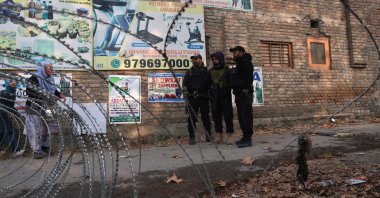 Indian policemen stand guard near the site of an accidental explosion on the outskirts of Srinagar, the summer capital of Indian Kashmir, Nov. 15, 2025. (EPA Photo)