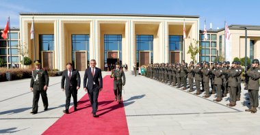 TRNC Parliament Speaker Ziya Öztürkler (2nd L) walks next to Turkish Cypriot President-elect Tufan Erhürman during the latter&#039;s arrival at the Parliament for an oath-taking ceremony, Lefkoşa (Nicosia), TRNC, Oct. 24, 2025. (AA Photo)