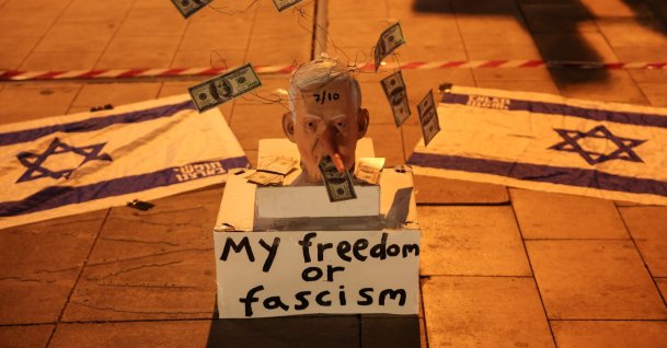 A mask mocking Israeli Prime Minister Benjamin Netanyahu is placed on the street during a demonstration, Tel Aviv, Israel, Nov. 15, 2025. (AFP Photo)