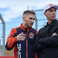 Moto2 rider Deniz Öncü (L) speaks with fellow Red Bull KTM Racing athlete Toprak Razgatlıoğlu ahead of the MotoGP World Championship’s final round, the Spanish Grand Prix, at the Ricardo Tormo Circuit, Valencia, Spain, Nov. 16, 2025. (AA Photo)
