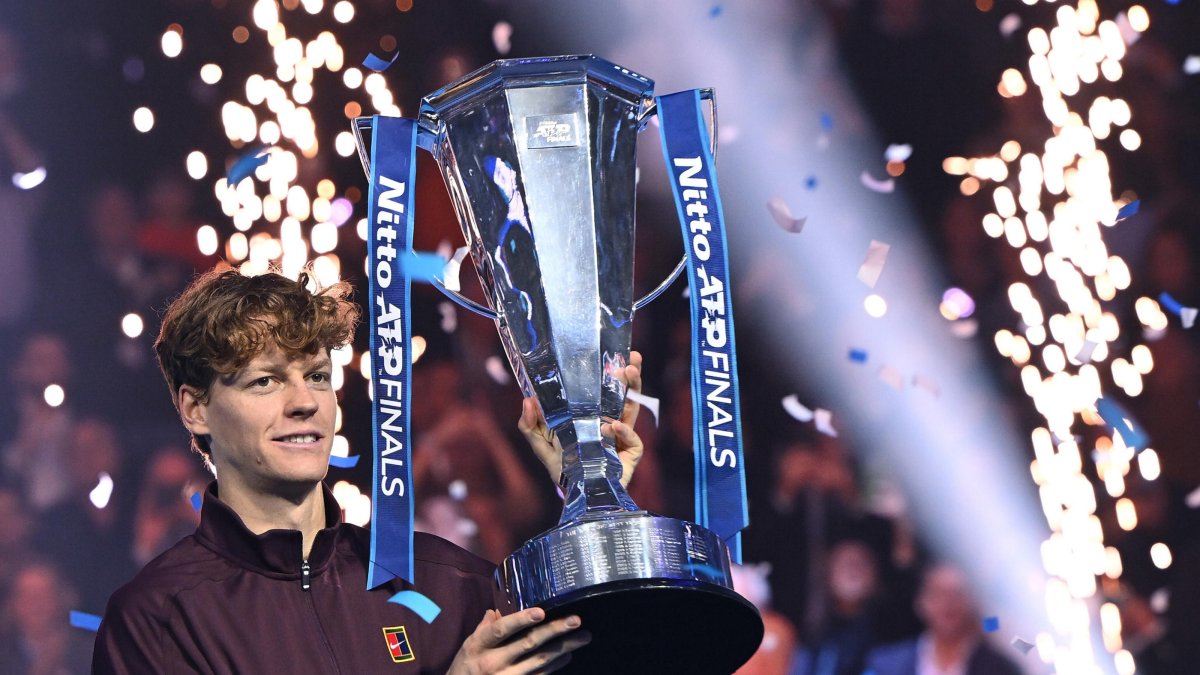 Italy's Jannik Sinner celebrates with the trophy after winning the men's singles final match against Spain's Carlos Alcaraz at the ATP Finals, Turin, Italy, Nov. 16, 2025. (EPA Photo)