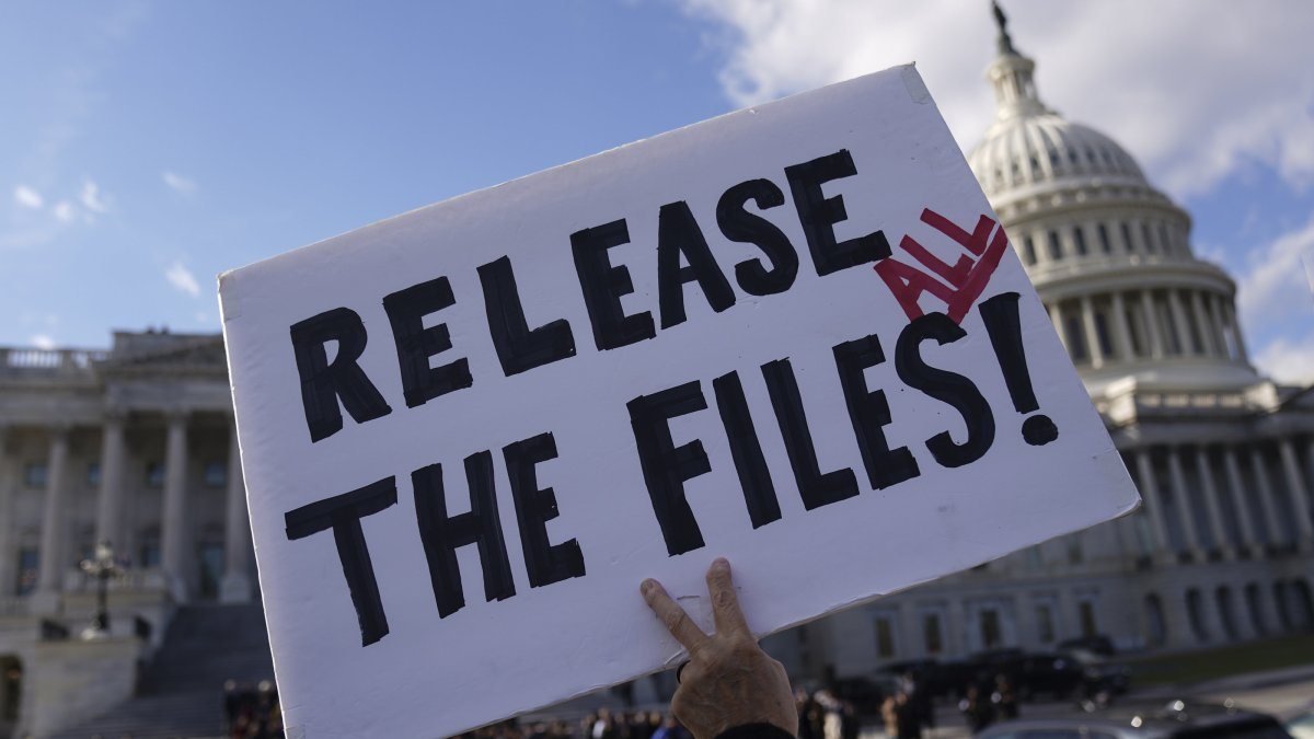 A protester holds a sign asking for the release of the Epstein files outside the U.S. Capitol in Washington, D.C., U.S., Nov. 12, 2025. (EPA Photo)