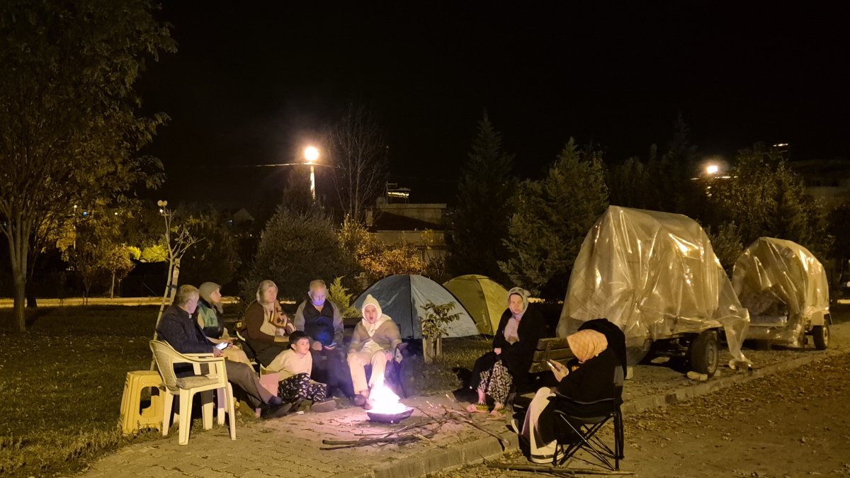 Residents gather outside their homes following the 4.9 magnitude earthquake in Sındırgı, Balıkesir, Türkiye, Oct. 11, 2025. (AA Photo)