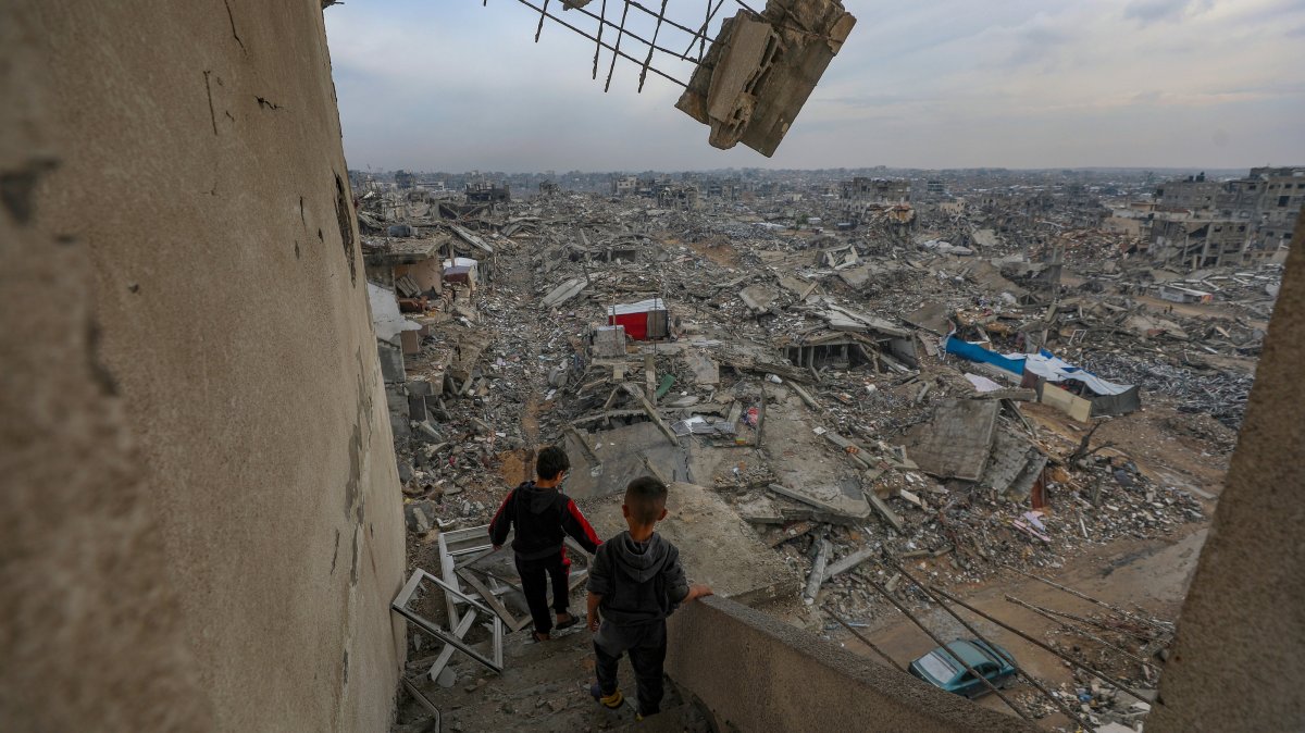 Palestinian children walk near their destroyed family house in the Sheikh Radwan neighborhood of Gaza City, Gaza Strip, Palestine, Nov. 14, 2025. (EPA Photo)