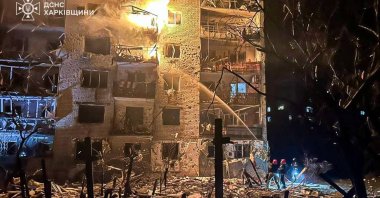 Firefighters work at the site of the apartment building hit by a Russian missile strike, amid Russia&#039;s attack on Ukraine, in the town of Balakliia, Kharkiv region, Ukraine, Nov. 17, 2025. (Reuters Photo)