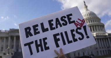 A protester holds a sign asking for the release of the Epstein files outside the U.S. Capitol in Washington, D.C., U.S., Nov. 12, 2025. (EPA Photo)