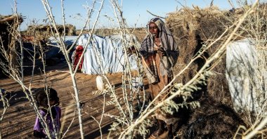 A Sudanese refugee talks to her daughter at Oure Cassoni camp in Chad, Nov. 14, 2025. (AFP Photo)