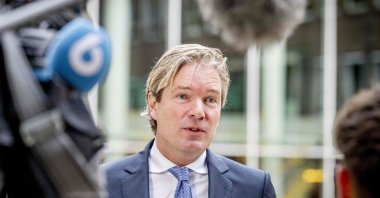 Dutch outgoing Minister of Justice and Security Foort van Oosten speaks to the press at the Ministry of General Affairs before the Cabinet meeting in The Hague, Oct. 31, 2025. (AFP File Photo)