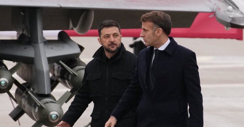 French President Emmanuel Macron and Ukrainian President Volodymyr Zelenskyy arrive to sign a letter of intent to buy up to 100 Rafale warplanes from France, at the Villacoublay air base near Paris, France, Nov. 17, 2025. (Reuters Photo)