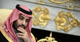 Crown Prince and Prime Minister of the Kingdom of Saudi Arabia Mohammed bin Salman looks on during a meeting with U.S. President Donald Trump (not pictured) in the Oval Office of the White House in Washington, D.C., Nov. 18, 2025. (AFP Photo)