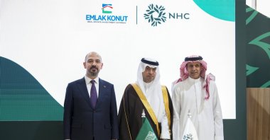 Emlak Konut&#039;s General Manager Yasir Yılmaz (L) signs the preliminary agreement for the project with the National Housing Corporation (NHC) at the &quot;Cityscape Global Riyadh 2025 Exhibition,&quot; Riyadh, Saudi Arabia, Nov. 18, 2025. (AA Photo)