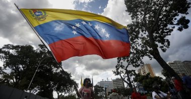 Supporters of President Nicolas Maduro rally in the capital Caracas, Venezuela, Nov. 17, 2025. (AA Photo)