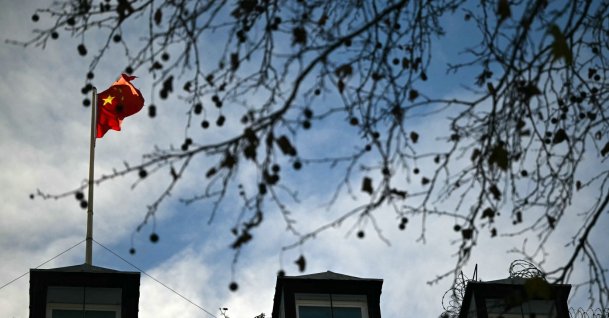 A flag flies atop a pole on the roof of the Embassy of the People&#039;s Republic of China in the United Kingdom, on Portland Place in London, Nov. 18, 2025. (AFP Photo)