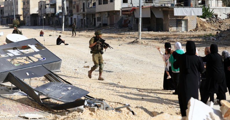 Israeli soldiers stop displaced Palestinians from Nur Shams refugee camp attempting to return to their camp, near the West Bank city of Tulkarem, Nov. 18, 2025. (EPA Photo)