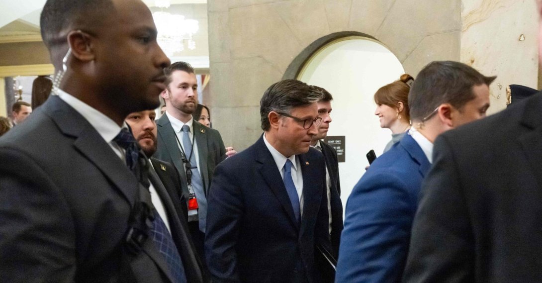US Speaker of the House Mike Johnson (C), Republican of Louisiana, walks back to his office following a vote on the release of the Epstein files at the US Capitol in Washington, D.C., Nov. 18, 2025. (AFP Photo)