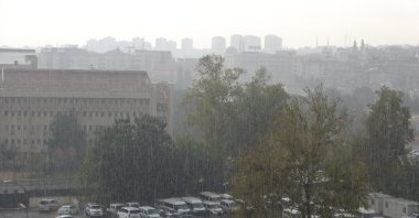 Heavy rain pours over city streets and infrastructure, causing localized flooding, Gaziantep, Türkiye, Nov. 13, 2025. (IHA Photo)