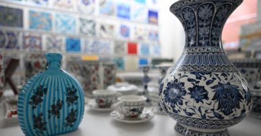 This photograph shows traditional Turkish patterns painted on tile in Iznik, Bursa, Türkiye, Oct. 14, 2025. (AFP Photo)