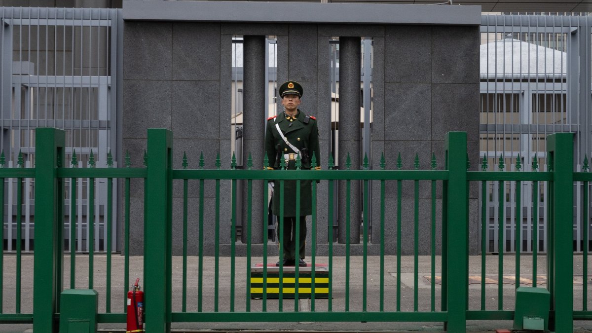 A security member stands guard at the Japanese Embassy in Beijing, China, Nov. 15, 2025. (EPA Photo)