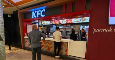 People wait in front of the KFC store, Istanbul, Türkiye, Jan. 14, 2024. (Shutterstock Photo)