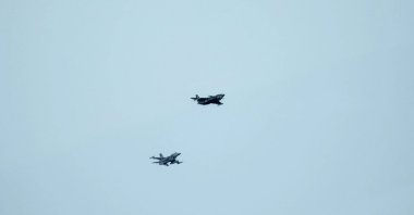 Bayraktar Kızılelma, Türkiye&#039;s first unmanned fighter aircraft, is seen during formation flight with F-16, Tekirdağ, northwestern Türkiye, Nov. 20, 2025. (AA Photo)