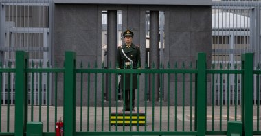A security member stands guard at the Japanese Embassy in Beijing, China, Nov. 15, 2025. (EPA Photo)