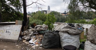 The Sandton skyline overlooks an informal settlement in Innesfree Park in Johannesburg, South Africa, Nov. 14, 2025. (AFP Photo)