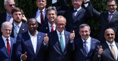 Vice President Cevdet Yılmaz (2nd R-front) and country representatives give thumbs-up during a group photo at the climate summit, Belem, Brazil, Nov. 7, 2025. (Reuters Photo)