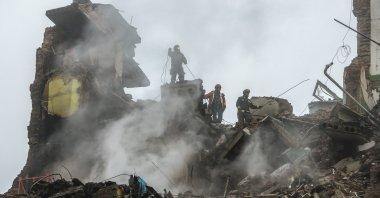 Ukrainian rescuers work at the site of a Russian strike on a high-rise residential building in Ternopil, western Ukraine, Nov. 20, 2025. (EPA Photo)