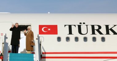 President Recep Tayyip Erdoğan and first lady Emine Erdoğan board the presidential plane for South Africa, Ankara, Türkiye, Nov. 21, 2025. (AA Photo)