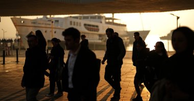 Commuters arrive to the Kabataş ferry terminal, Istanbul, Türkiye, Nov. 4, 2025. (AP Photo)