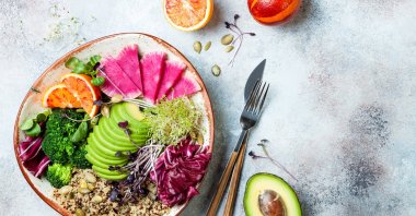 A bowl of fresh salad featuring a variety of plant-based ingredients. (Shutterstock Photo)