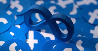 Meta and Facebook logos are seen in this illustration, Feb. 15, 2022. (Reuters Photo)