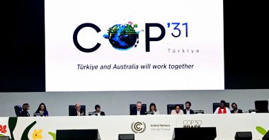 A screen shows the COP31 logo organized by Türkiye and Australia during the COP30 U.N. Climate Change Conference, Belem,  Brazil, Nov. 22, 2025. (AFP Photo)