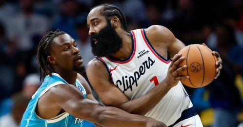 Clippers&#039; James Harden (R) protects the ball from Hornets&#039; Sion James during an NBA game in Charlotte, N.C., Nov. 22, 2025. (AP Photo)
