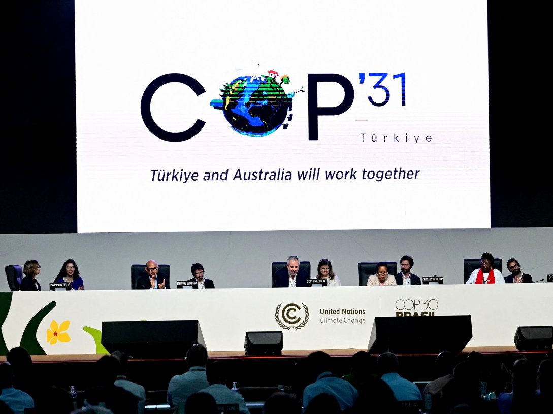 A screen shows the COP31 logo organized by Türkiye and Australia during the COP30 U.N. Climate Change Conference, Belem,  Brazil, Nov. 22, 2025. (AFP Photo)