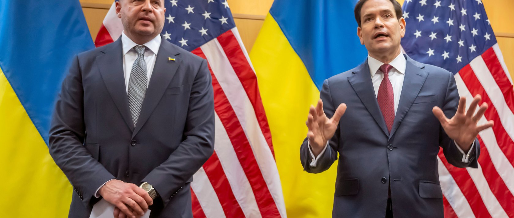 Head of the Office of the President of Ukraine Andriy Yermak (L) and U.S. Secretary of State Marco Rubio talk to the press as their consultations continue at the U.S. Mission to International Organizations in Geneva, Switzerland, Nov. 23, 2025. (AP Photo)