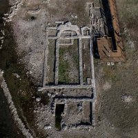 The remains of the sunken Byzantine Basilica of the Holy Fathers on the shore of Lake Iznik, Iznik, Bursa, Türkiye, Oct. 31, 2025. (AFP Photo)