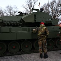 Soldiers discuss the Leopard 2A8 main battle tank during a rollout event, Munich, Germany, Nov. 19, 2025. (EPA Photo)
