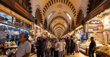 People walk and shop inside Kapalıçarşı, the historic covered bazaar, Istanbul, Türkiye, Sept. 21, 2025. (Shutterstock Photo)