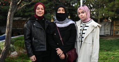 Meryem Yılmaz Jarada (L) reunites with her mother Kevser Yılmaz Jarada (C) after two years of separation, Ankara, Türkiye, Nov. 20, 2025. (AA Photo)