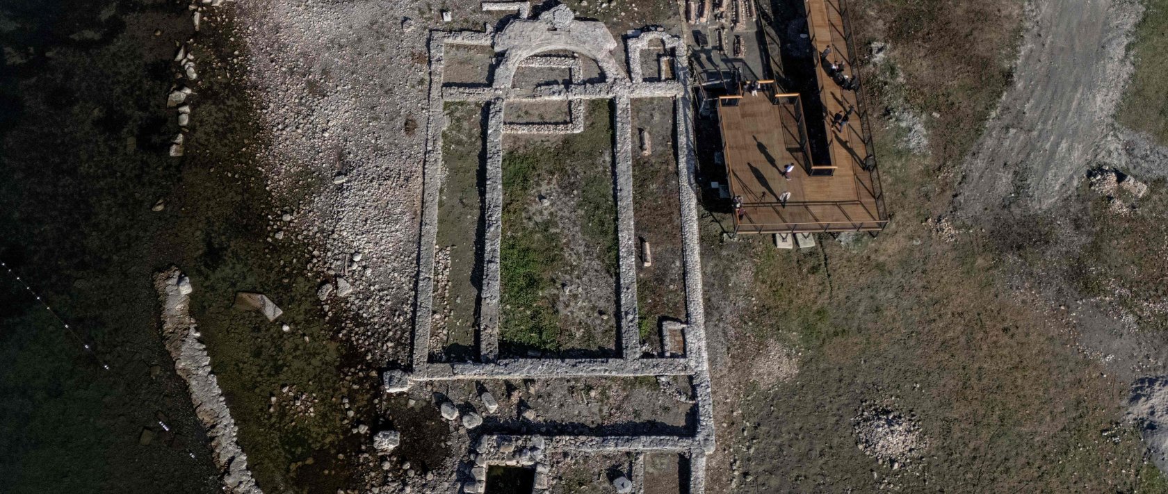 The remains of the sunken Byzantine Basilica of the Holy Fathers on the shore of Lake Iznik, Iznik, Bursa, Türkiye, Oct. 31, 2025. (AFP Photo)